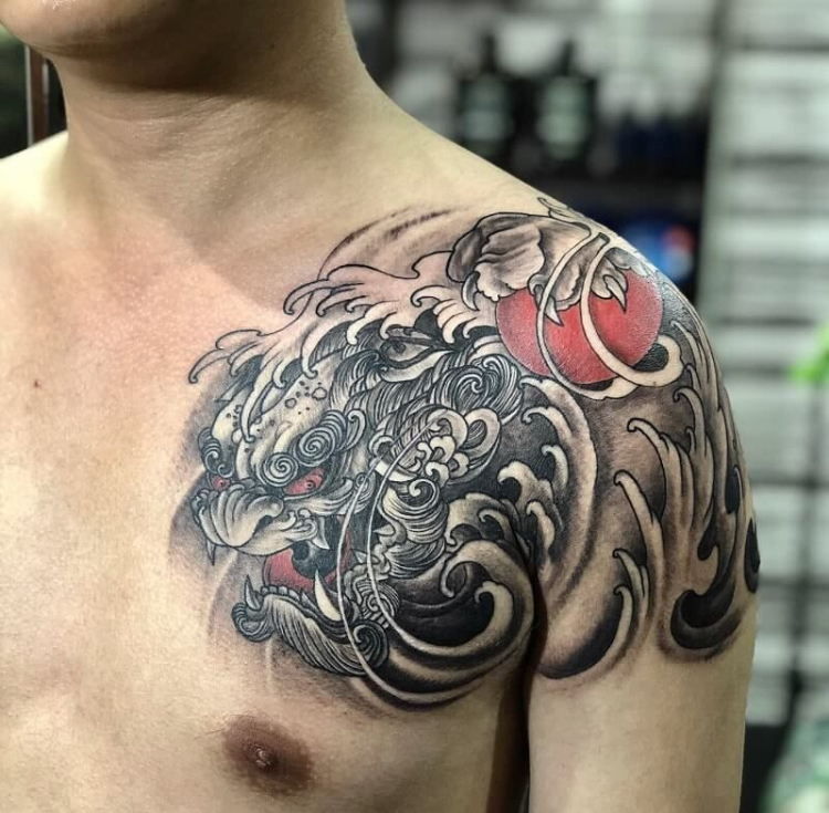 Tattoo kỳ lân ngậm kim quy mang ý nghĩa phong thuỷ