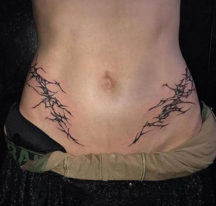 Tattoo nửa bụng cho nữ hình vết nứt cool ngầu