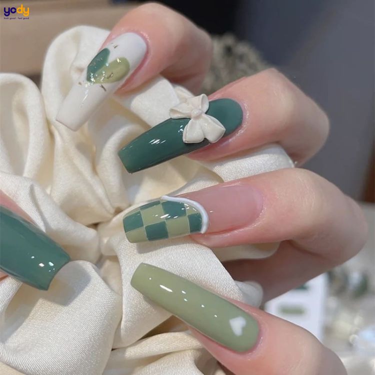 Nail màu xanh ngọc hoạt tiết nơ